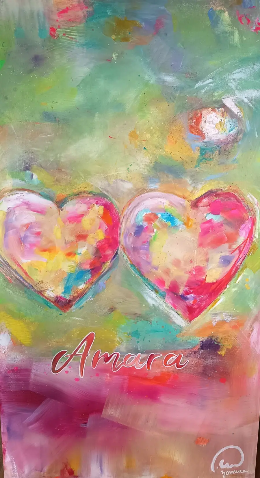 Cuadro colorido de AMARA con dos corazones pintados